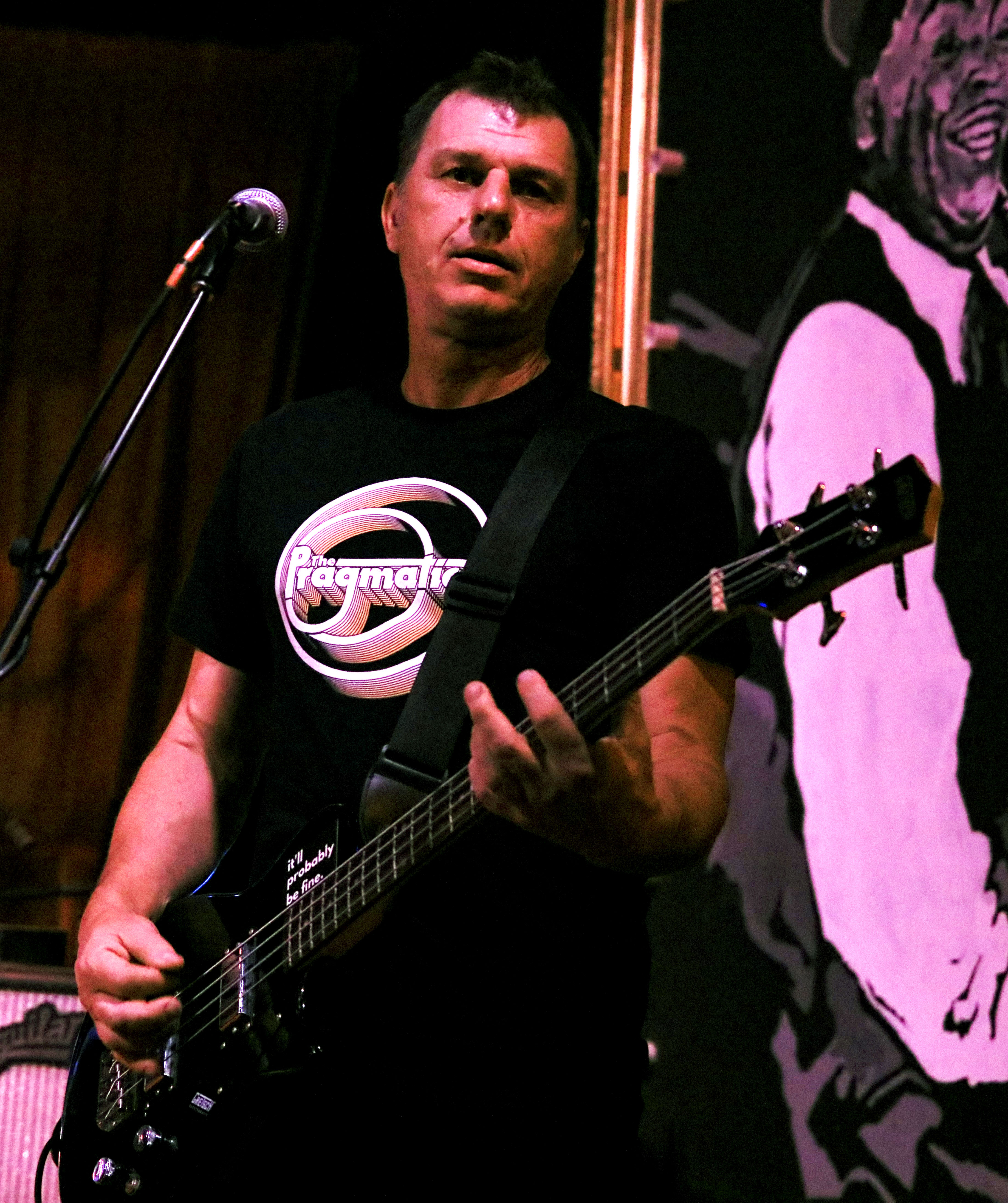 Simon Bates playing bass with The Pragmatics at Lazybones in November 2024